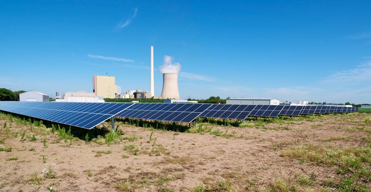 Stock photo of Solar park, biogas plant and coal plant