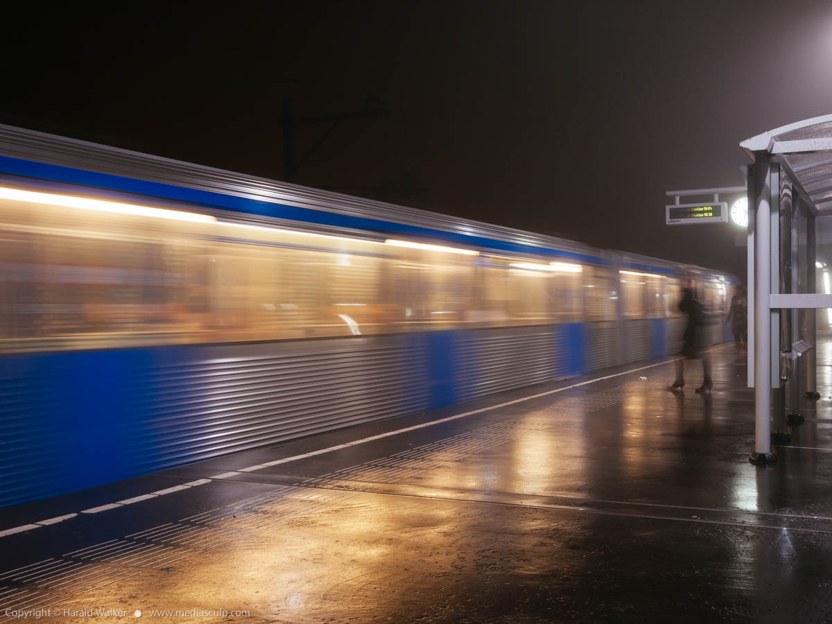 Stock photo of Metro train in foggy night