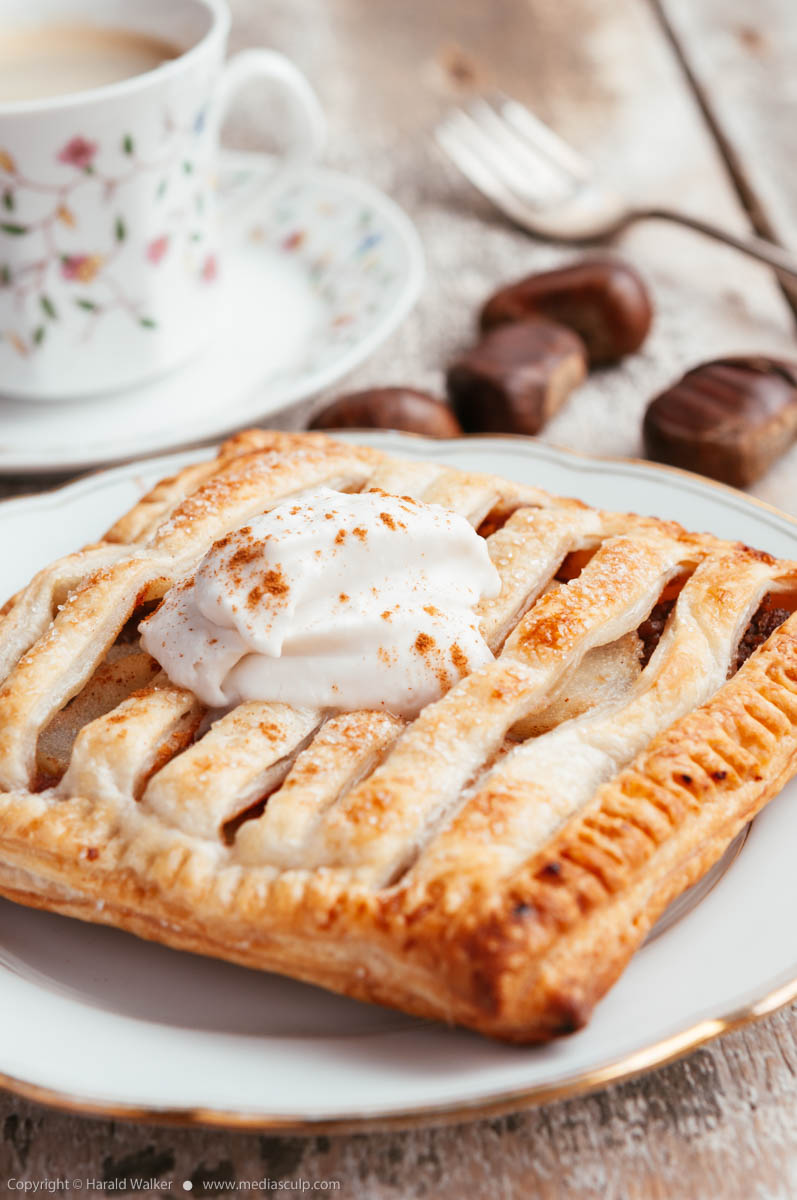 Stock photo of Chestnut-Pear Jalousie Tart with Amaretto Coconut Cream