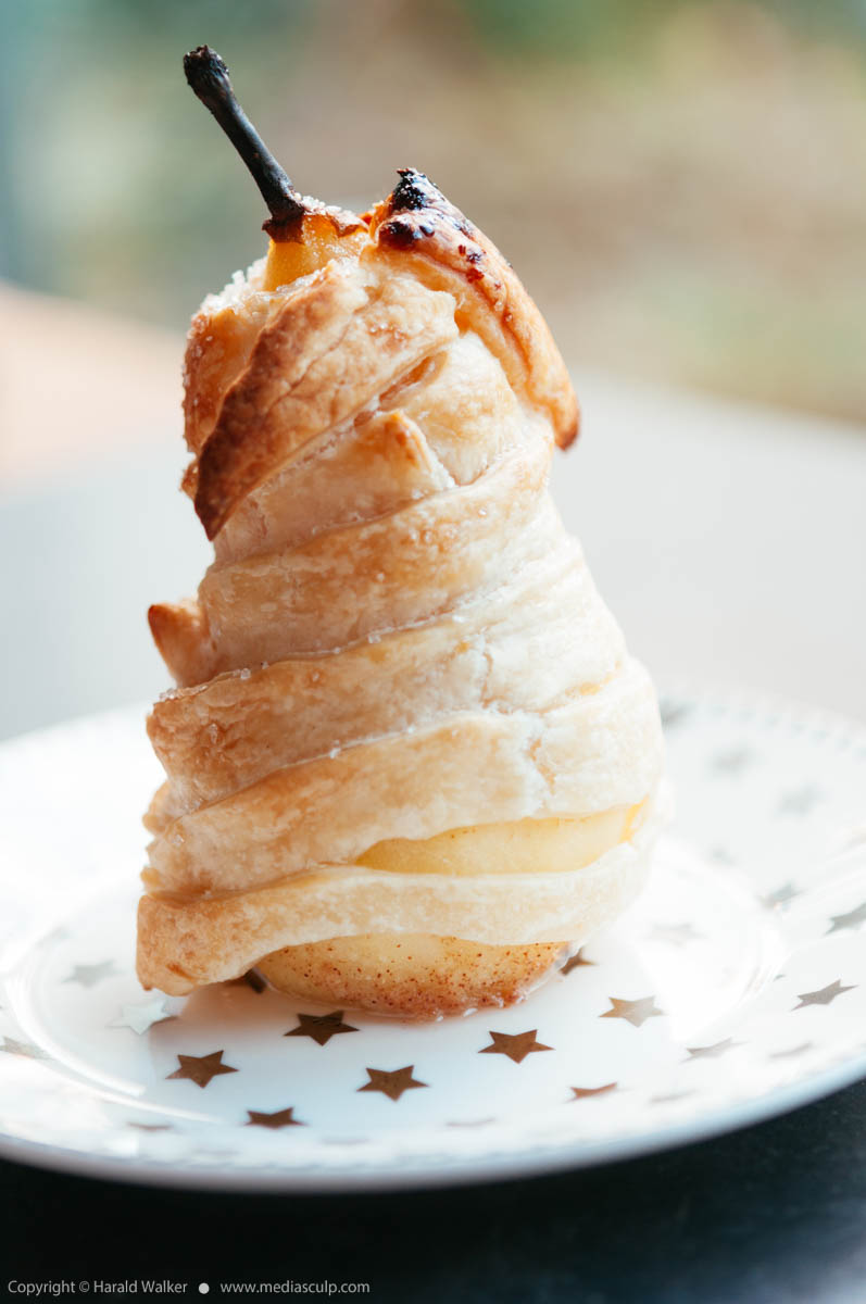 Stock photo of Baked Nut Filled Pears en Croute with Lemon Syrup