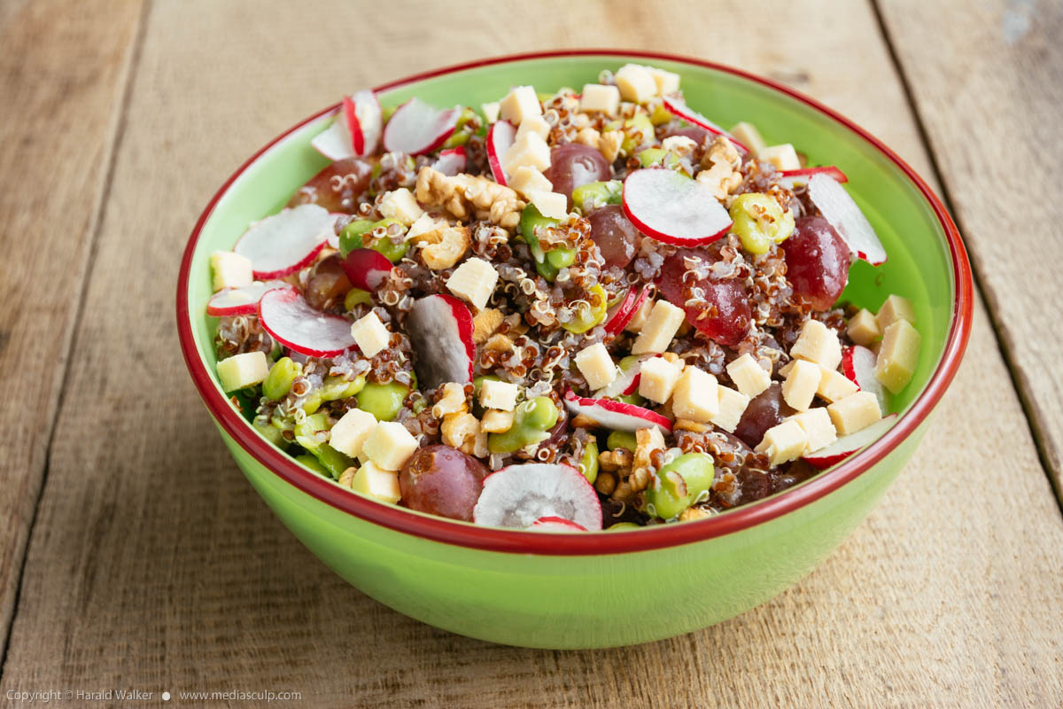 Stock photo of Quinoa Salad with Walnuts, Fava Beans, Radishes and Soy Cheese