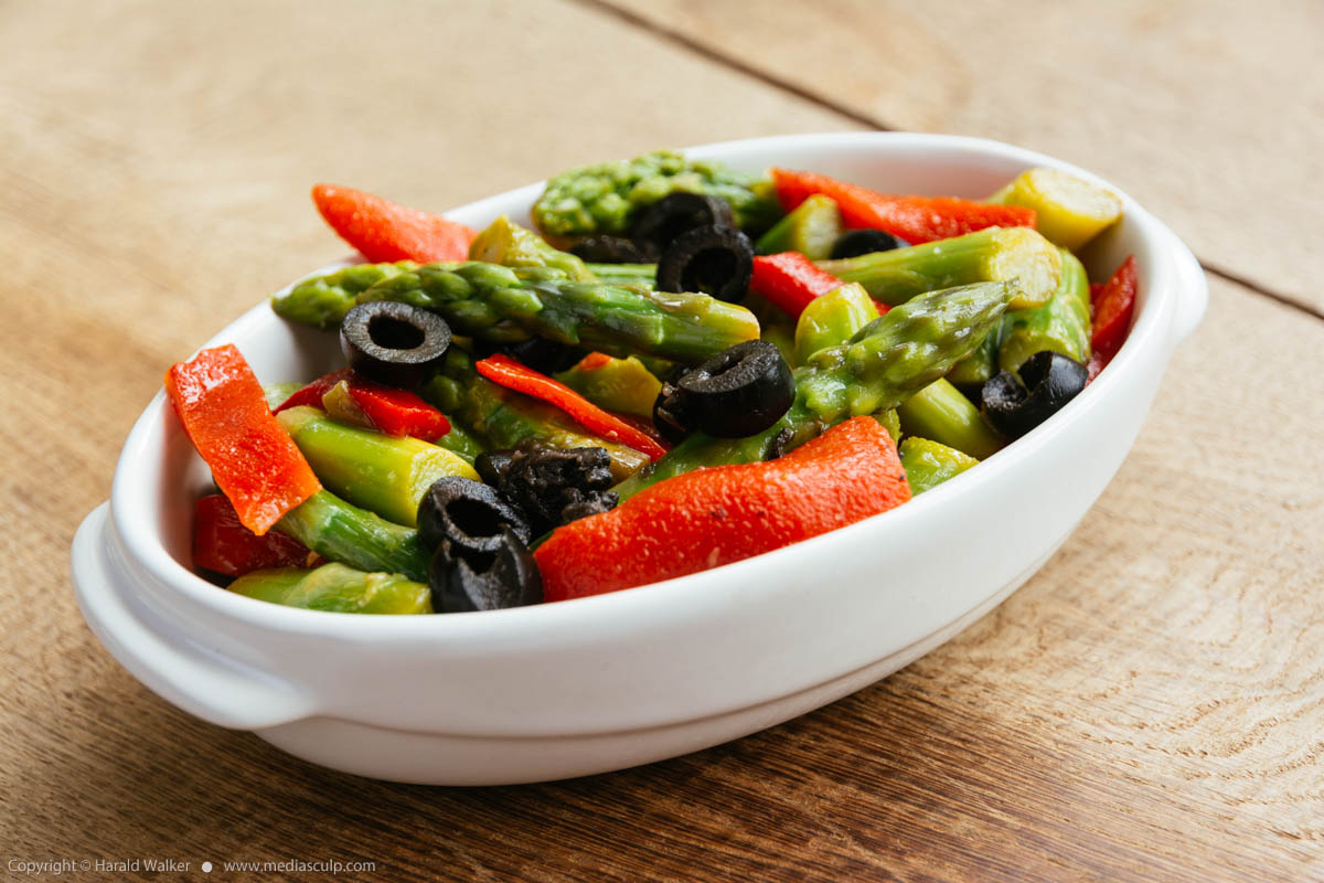 Stock photo of Roasted Pepper, Asparagus marinated in a Raspberries and Cilantro Vinaigrette