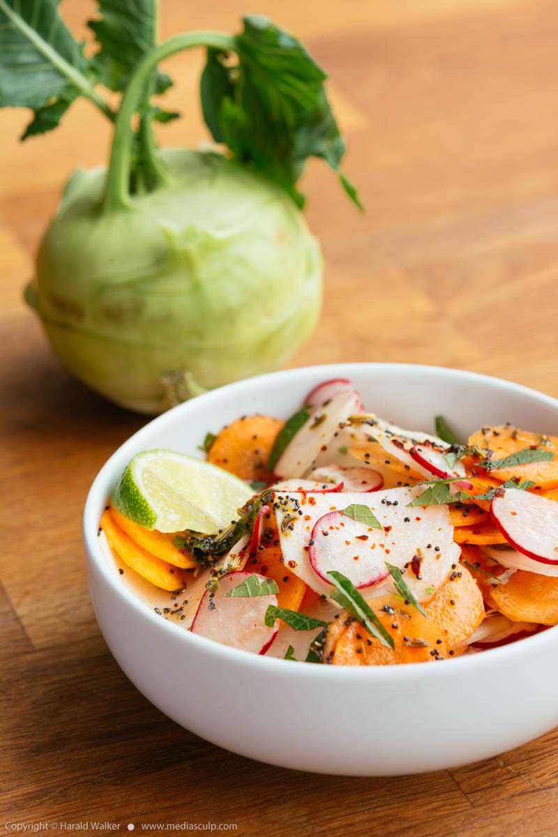 Stock photo of Crunchy Kohlrabi, Carrot and Radish Salad