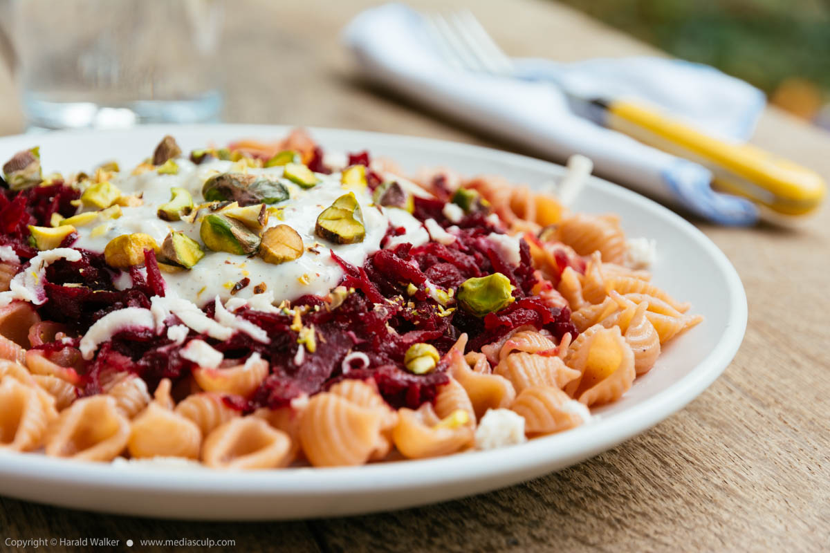 Stock photo of Red beet on pasta