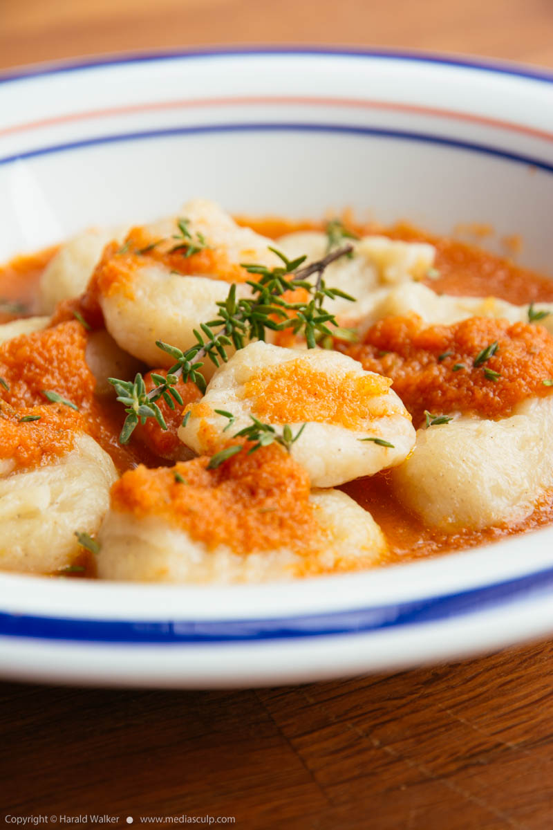 Stock photo of Celery Root Gnocchi with Apple Carrot Sauce