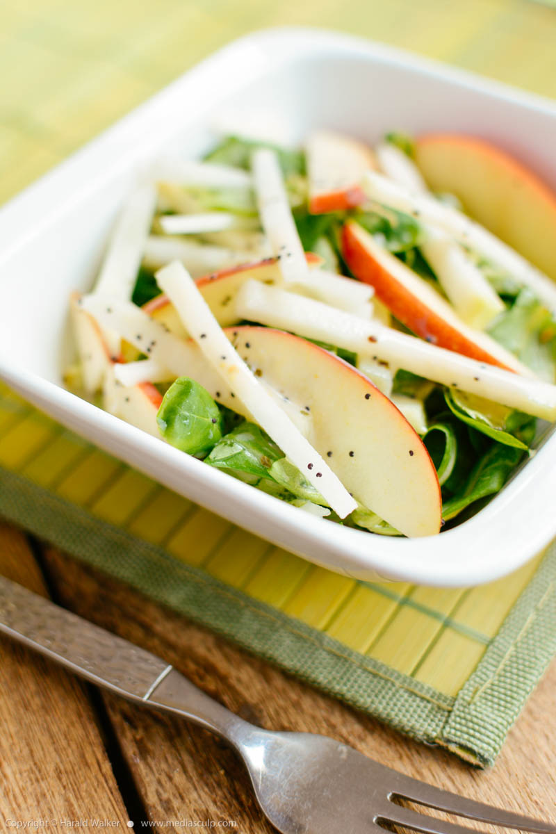 Stock photo of Field Salad, Kohlrabi and Apple Salad with Minty Poppy Seed Dressing