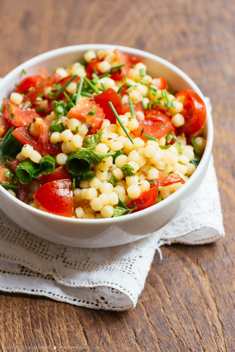 Stock photo of Pearl Couscous, Tomoato, Herb Salad