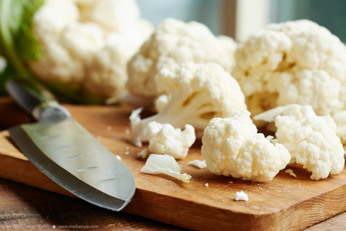 Stock photo of Cutting cauliflower
