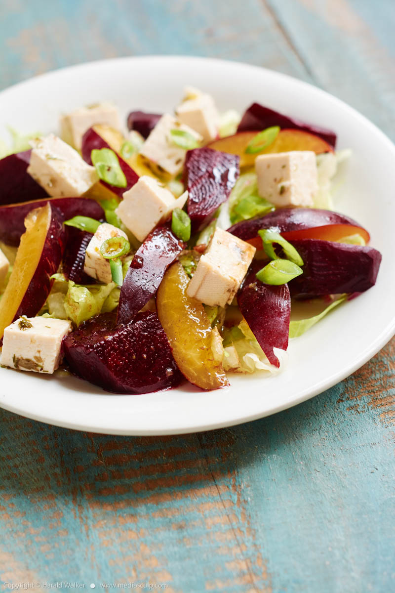Stock photo of Beets with plums and tofu