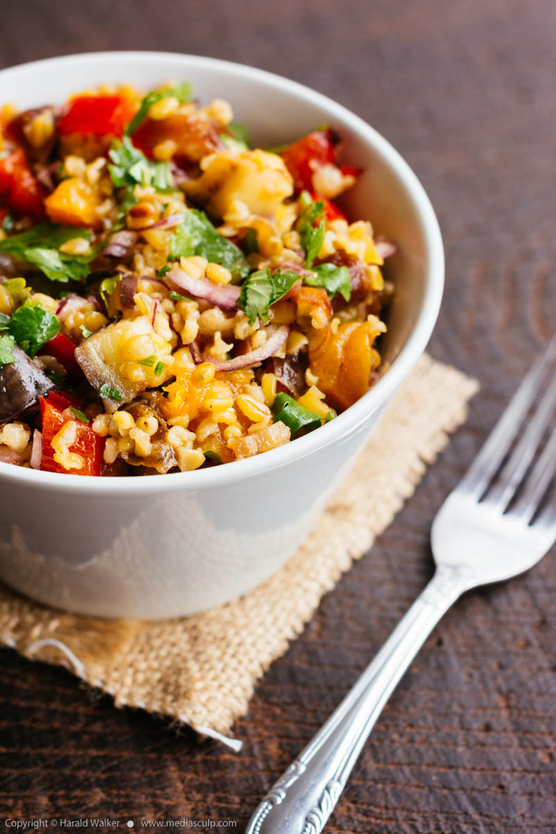 Stock photo of Freekeh Salad with Eggplant, Apricots and Dates