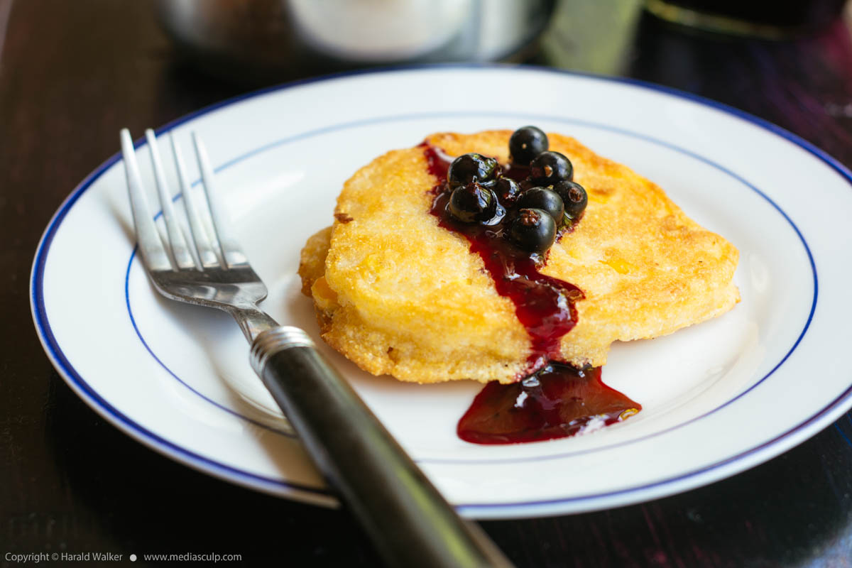 Stock photo of Corn Pancakes with Black Currant Sauce