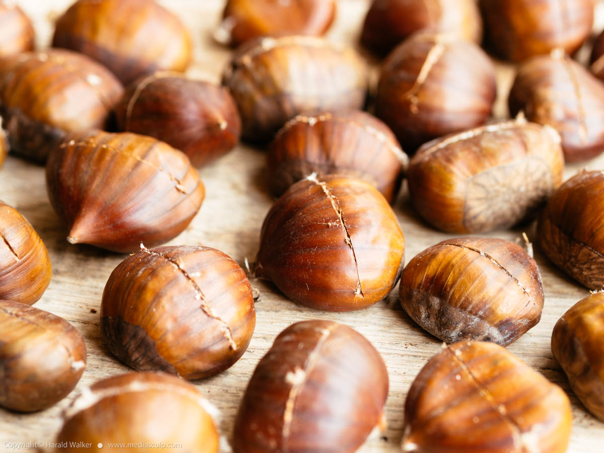Stock photo of Scored chestnuts