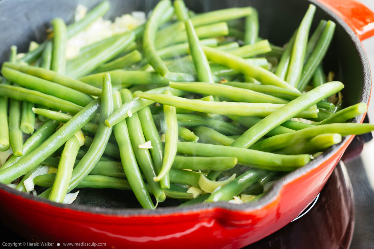 Stock photo of Frying green beans