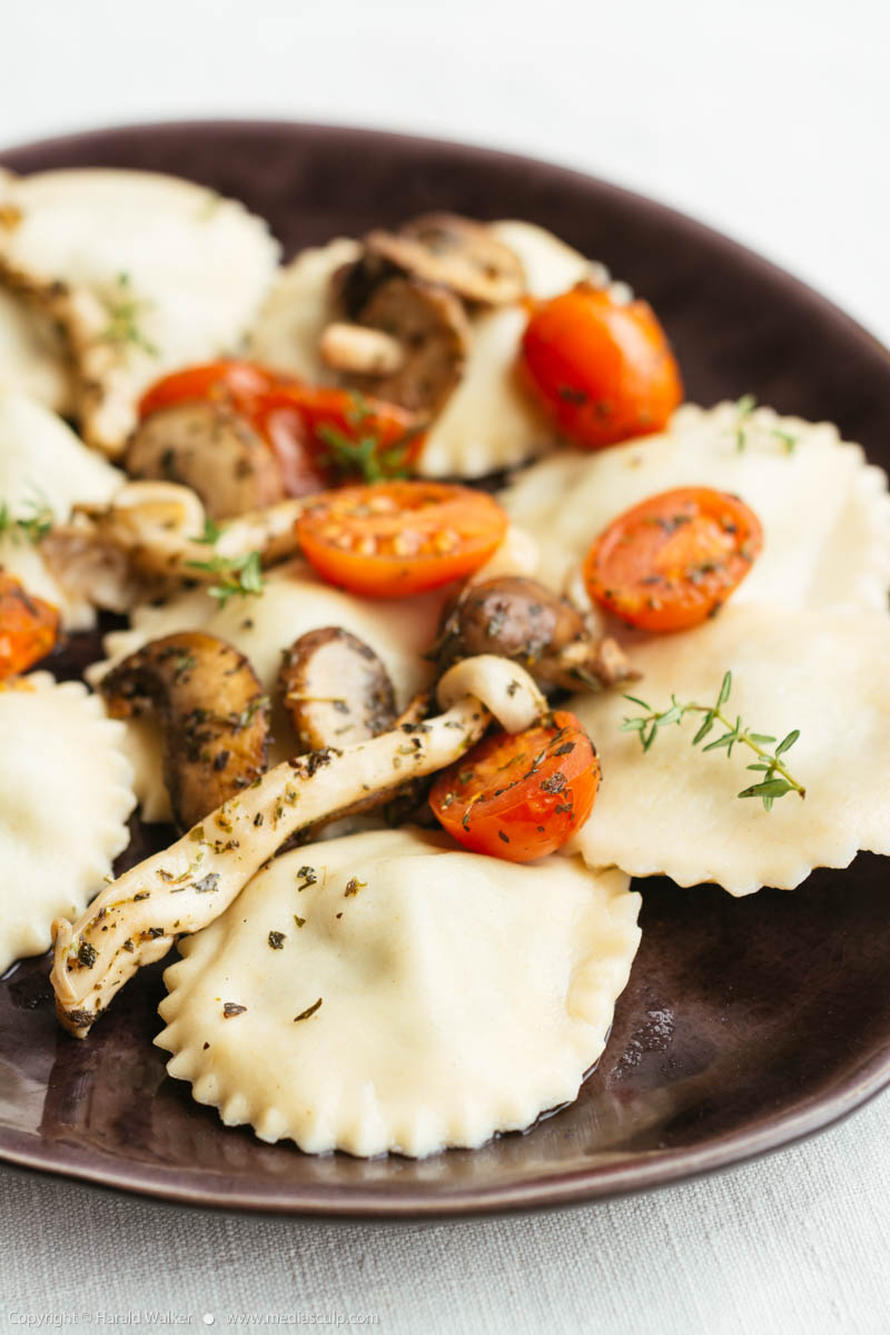 Stock photo of Ravioli with Mushrooms and Tomatoes