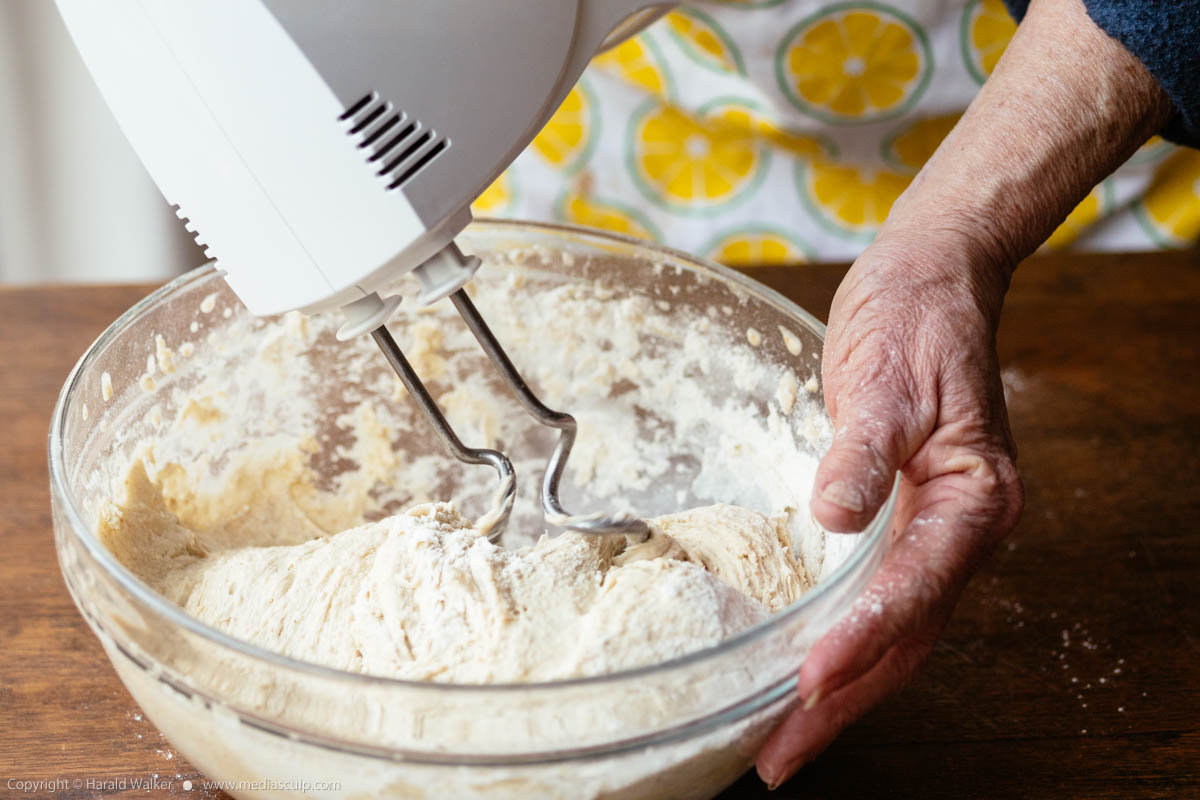 Stock photo of Kneading bread dough