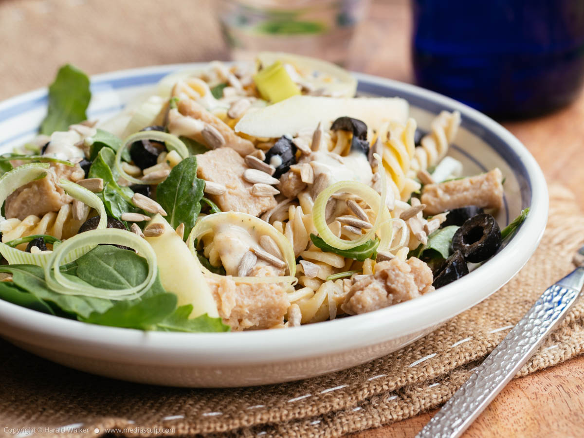 Stock photo of Spiral Pasta with Vegan Chickun Pieces and Pears