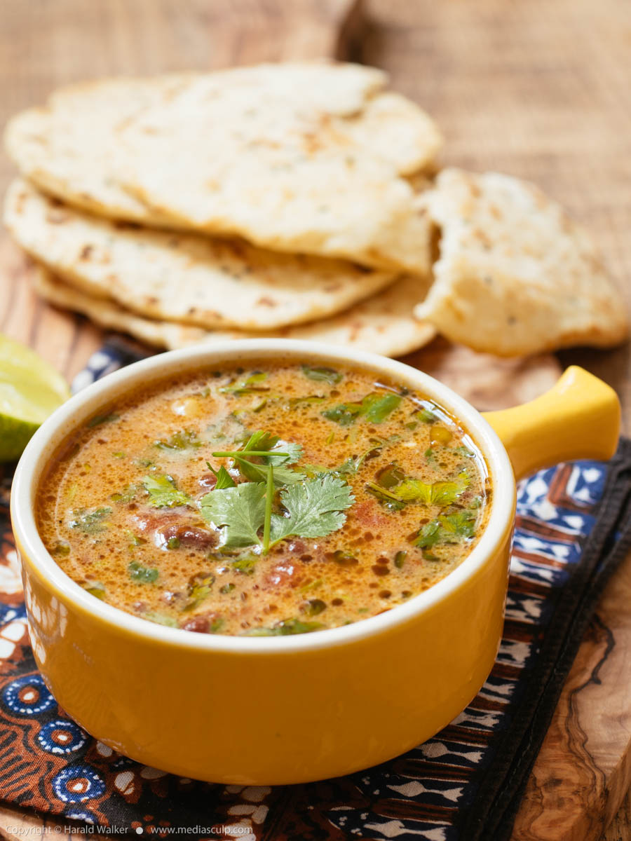 Stock photo of Curried Mung Bean Soup with Naan Breads