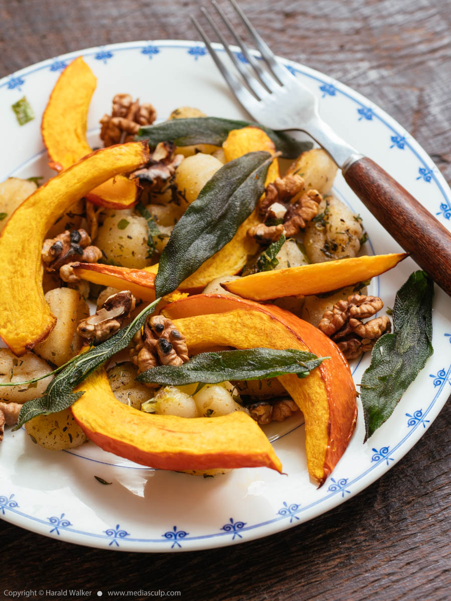Stock photo of Gnocchi with Winter Squash and Walnuts