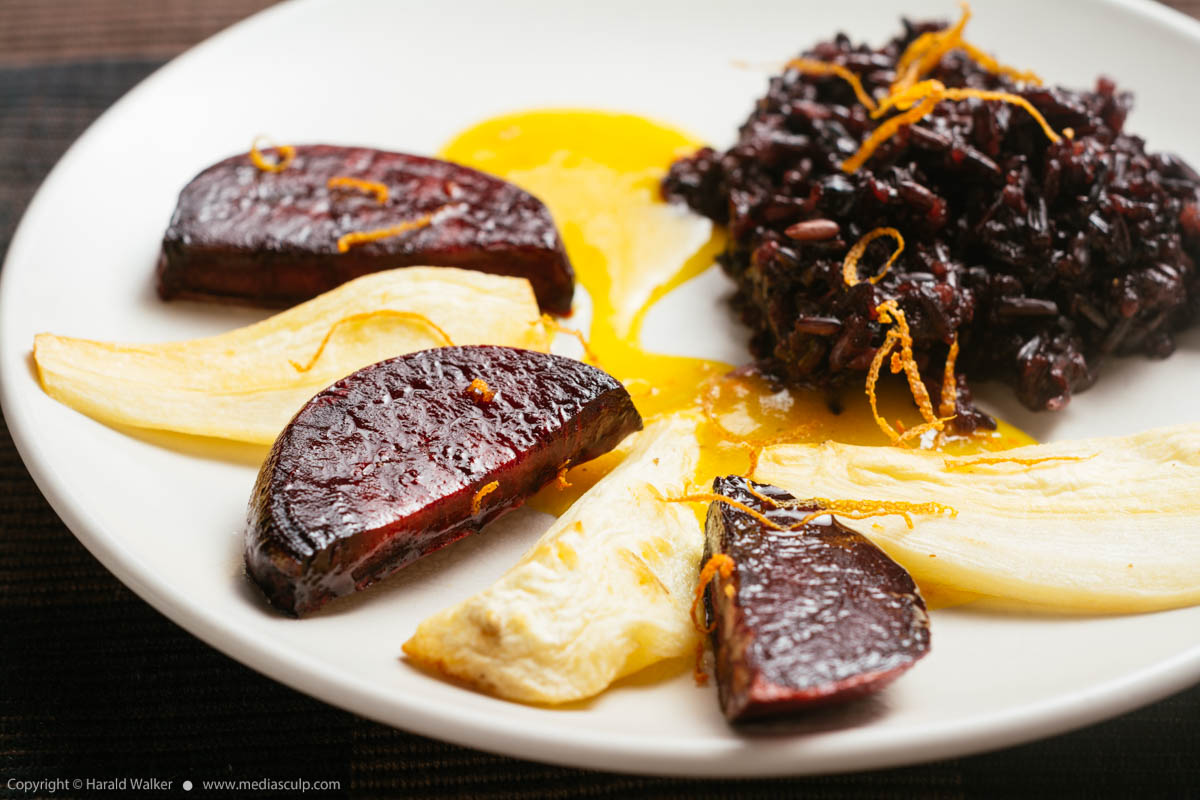 Stock photo of Purple Forbidden Rice with Roasted Parsnips and Beets with Orange Sauce
