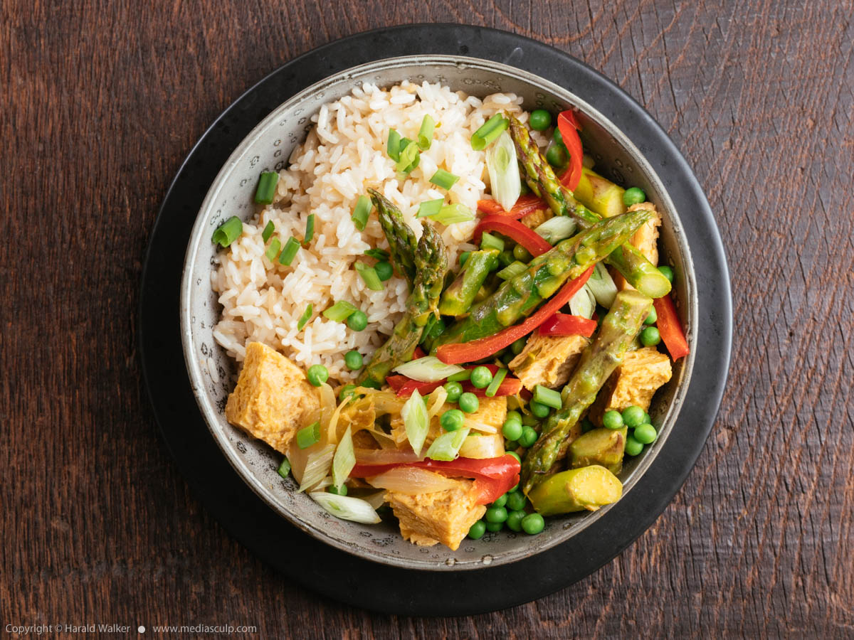 Stock photo of Thai Curried TVP Pieces with Asparagus and Peas