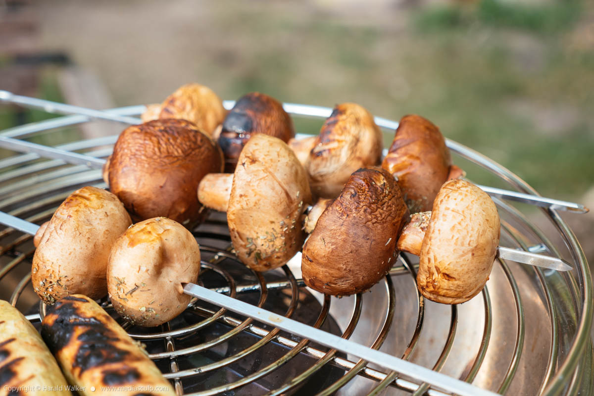 Stock photo of Grilling mushrooms