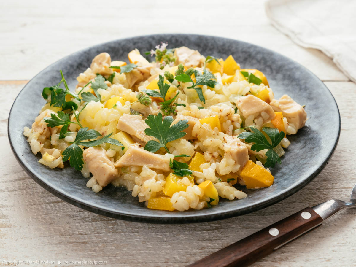 Stock photo of Risotto with “Chickun” Golden Summer Squash and Yellow Bell Pepper
