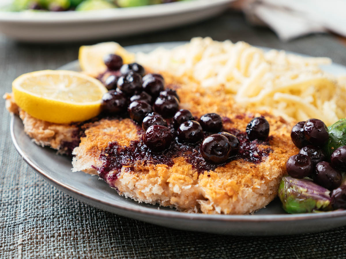 Stock photo of TVP Schnitzels with Pickled Blueberry Sauce