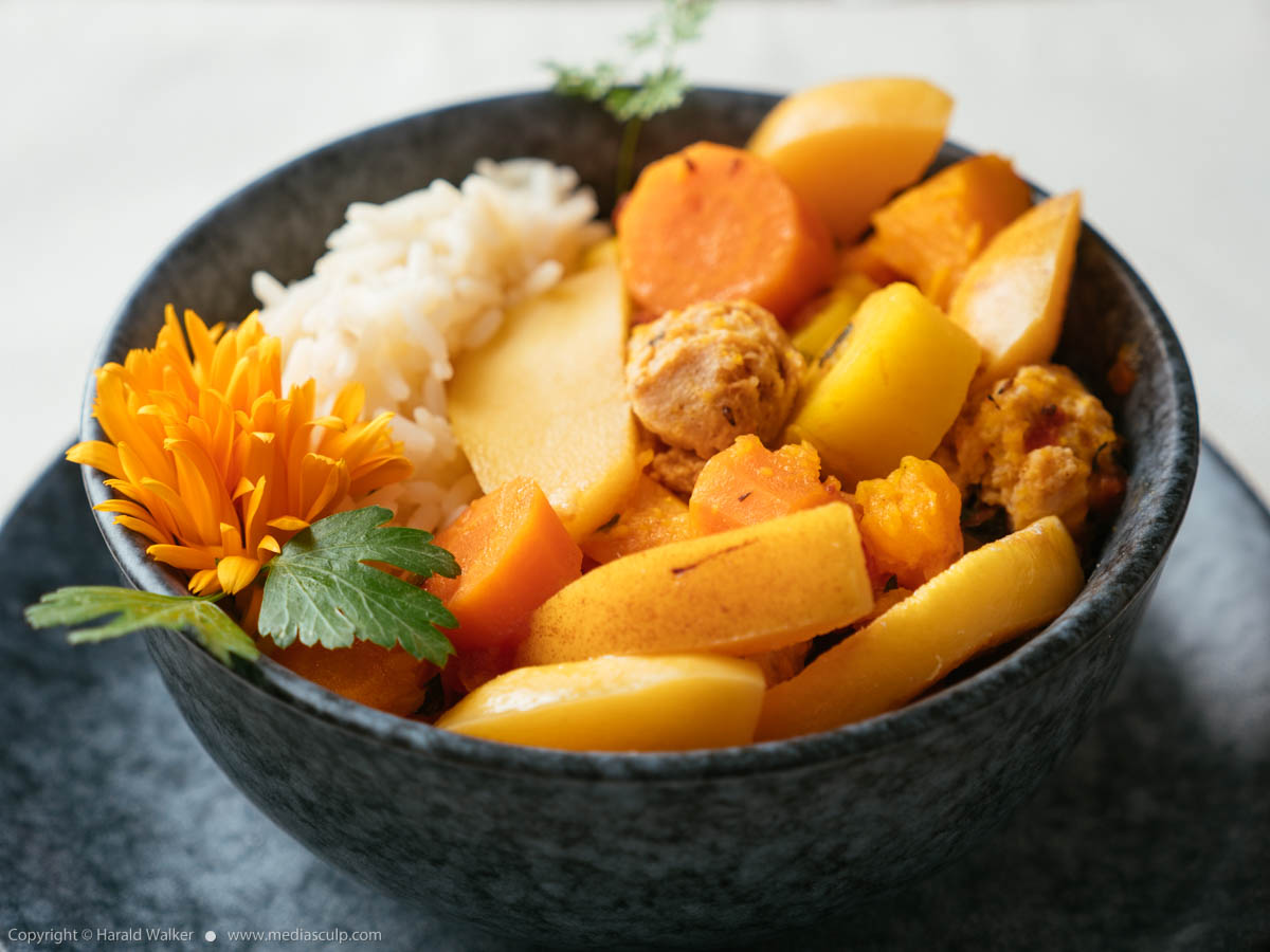 Stock photo of TVP, Pumpkin, Carrot Stew with Quince