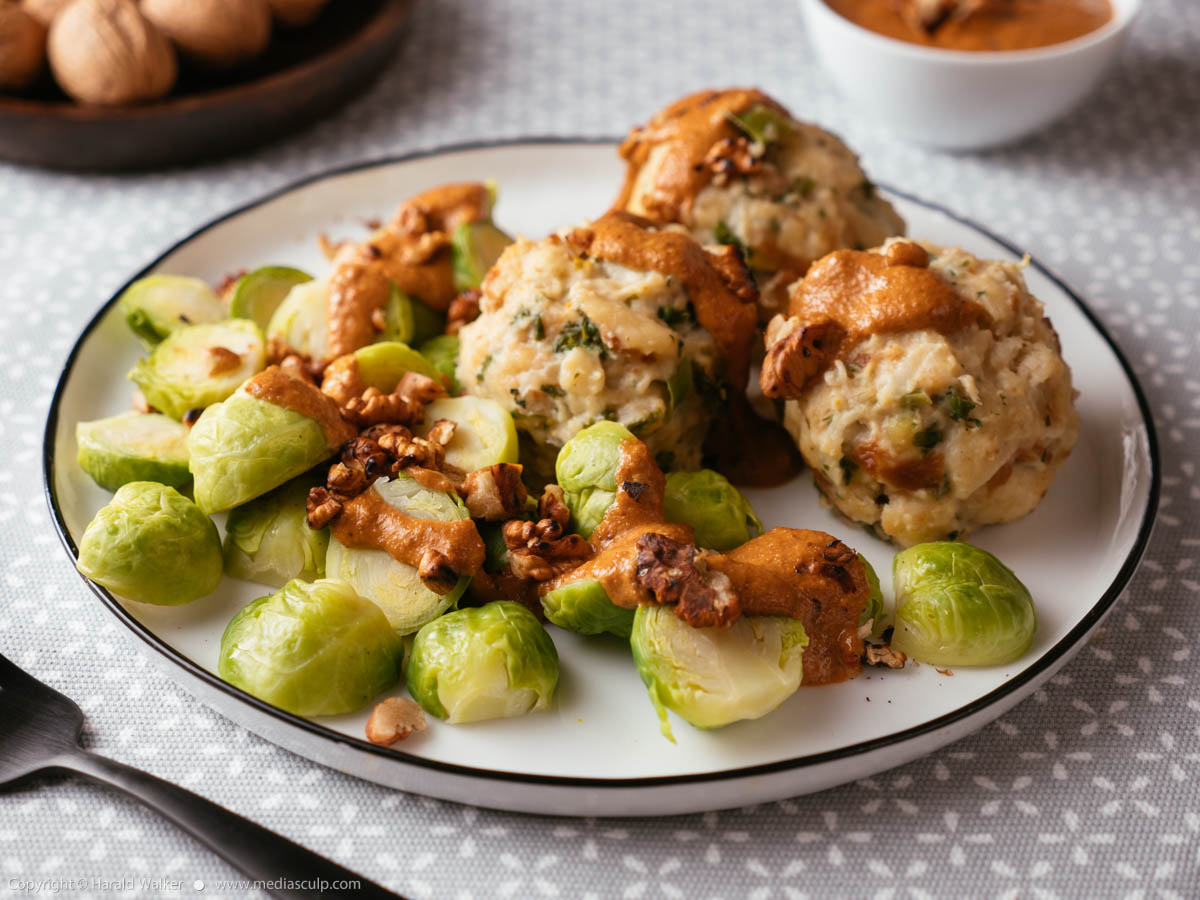 Stock photo of Brussels Sprouts & German Bread Dumplings with Walnut Butter Sauce