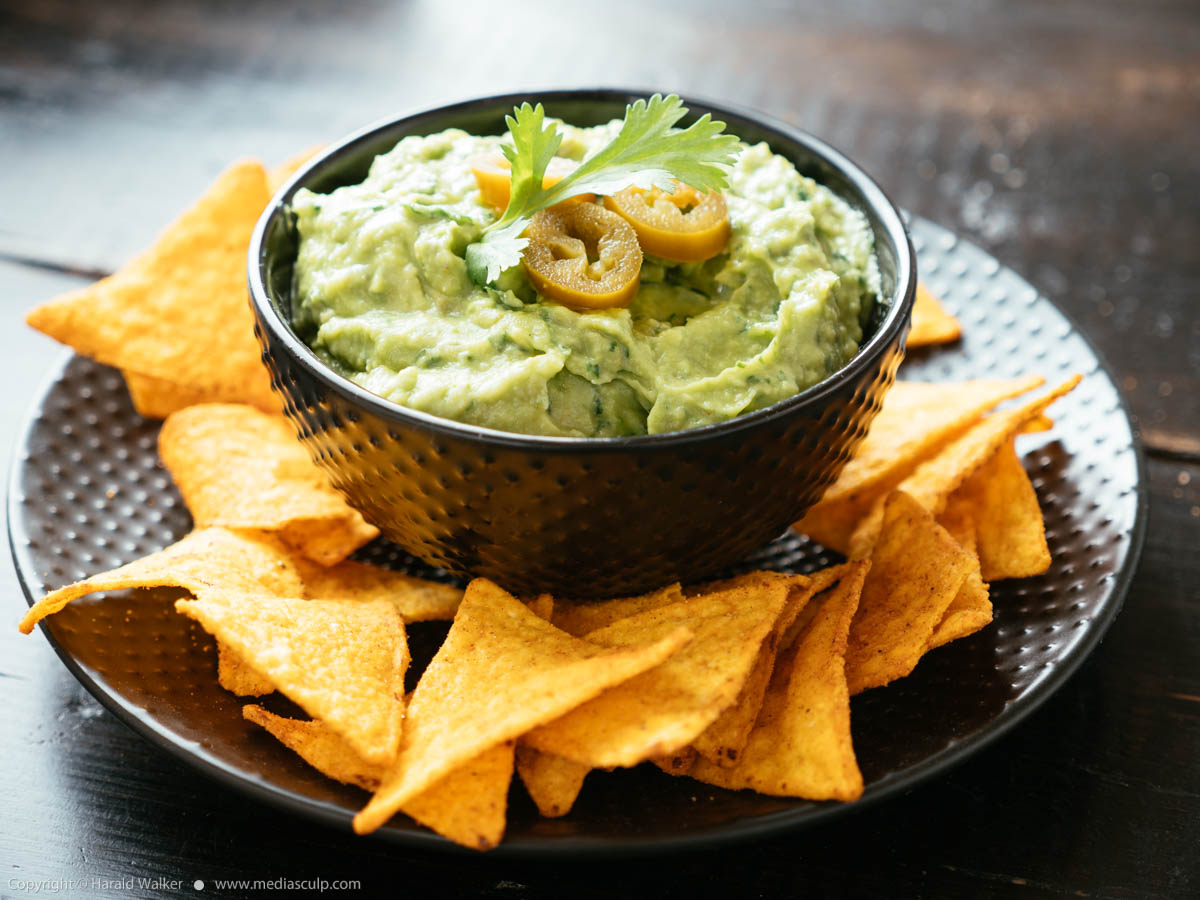 Stock photo of Guacamole with Corn Chips