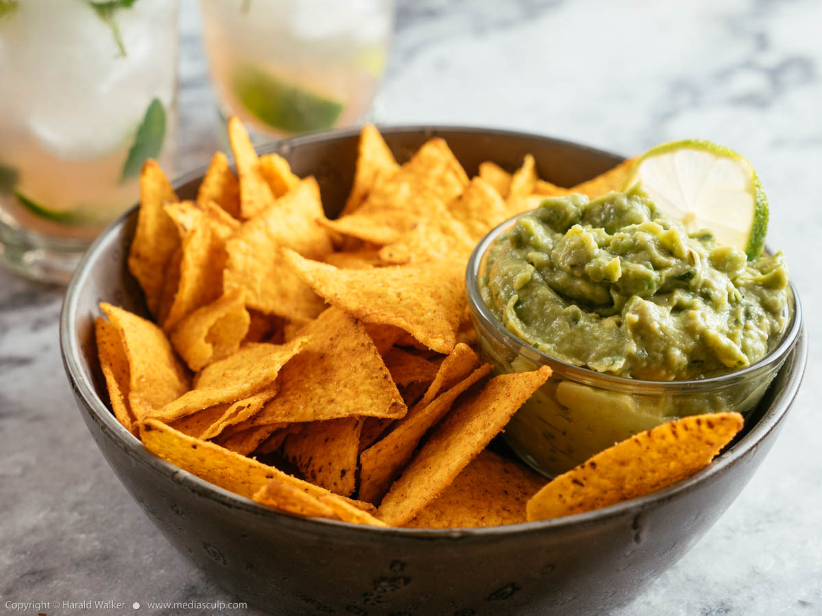 Stock photo of Guacamole, Chips and Mojito