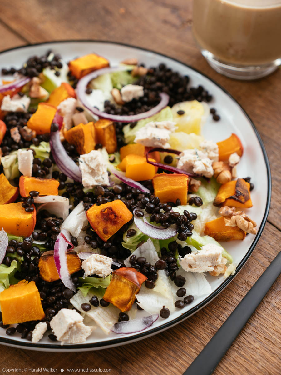 Stock photo of Roasted Pumpkin and Beluga Lentil Salad