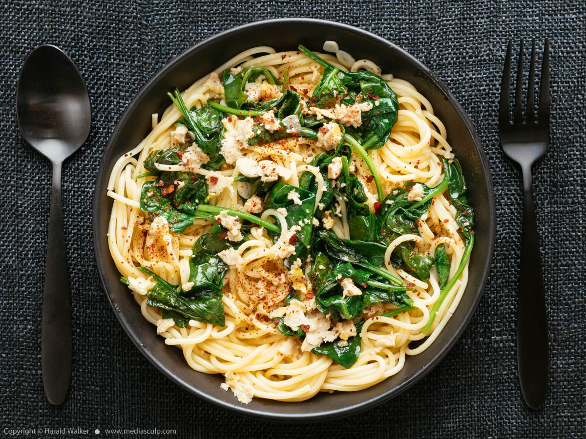 Stock photo of Garlicy Spinach on Spaghetti