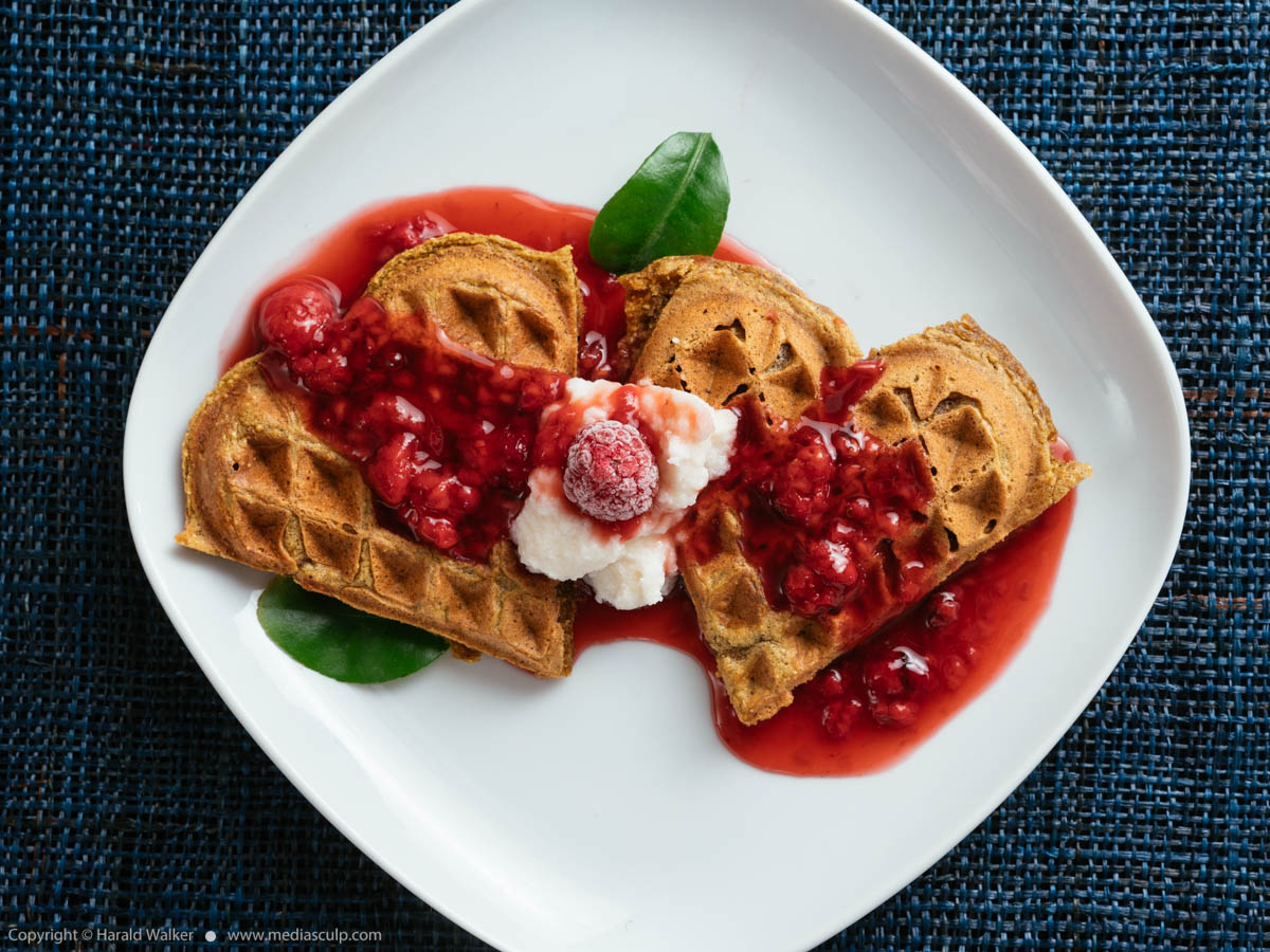 Stock photo of Beet Waffles with Raspberry Sauce