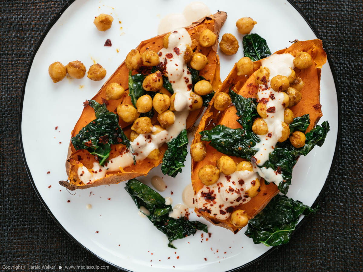 Stock photo of Baked Sweet Potatoes Chickpeas and Kale