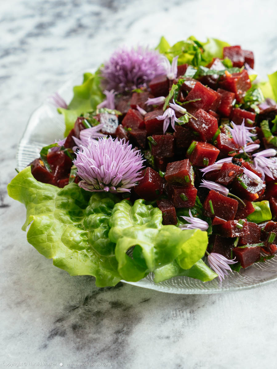 Stock photo of Beet Salad with Chive Blossoms