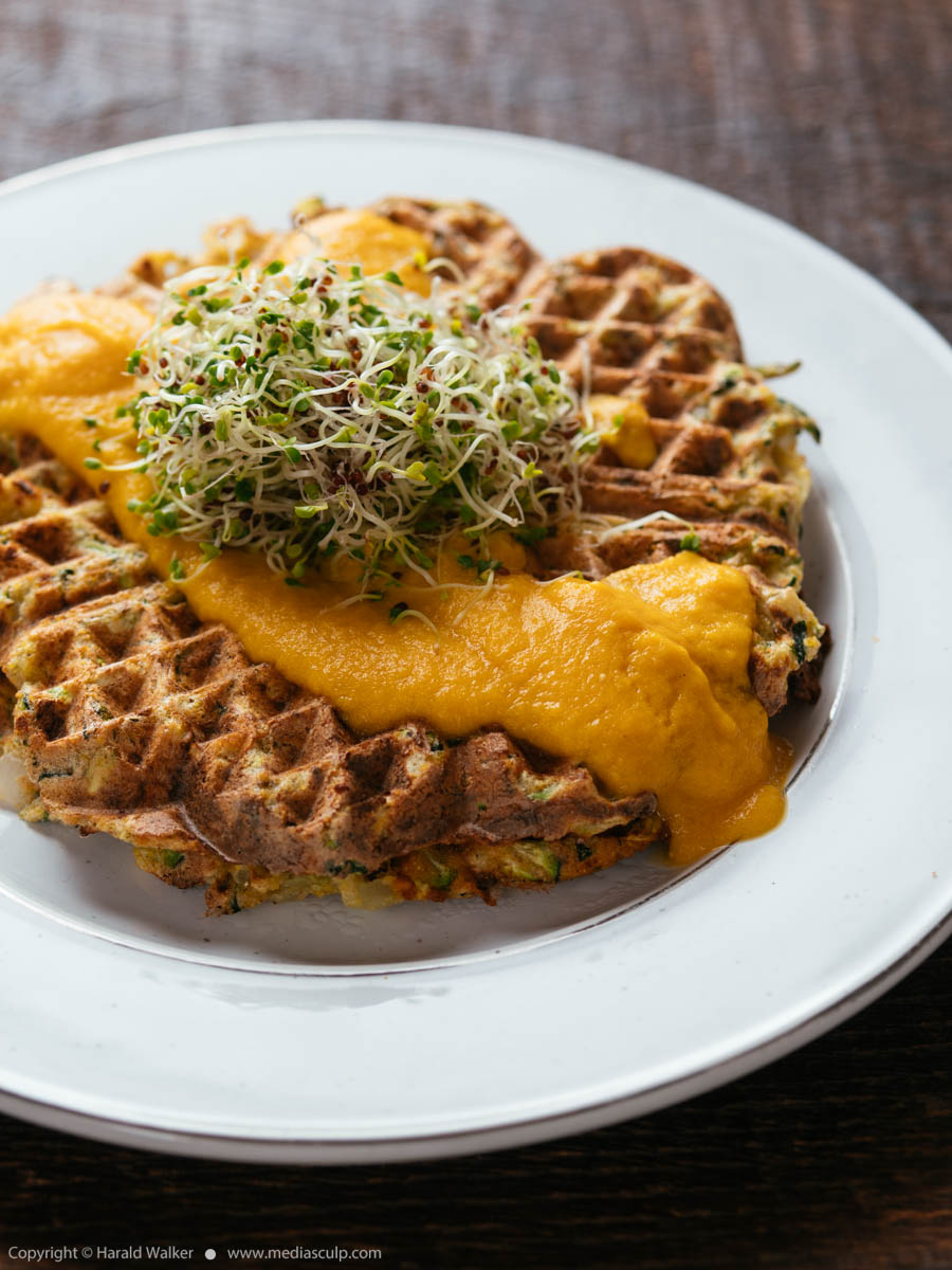 Stock photo of Zucchini Waffles with Vegan Cheddar Sauce