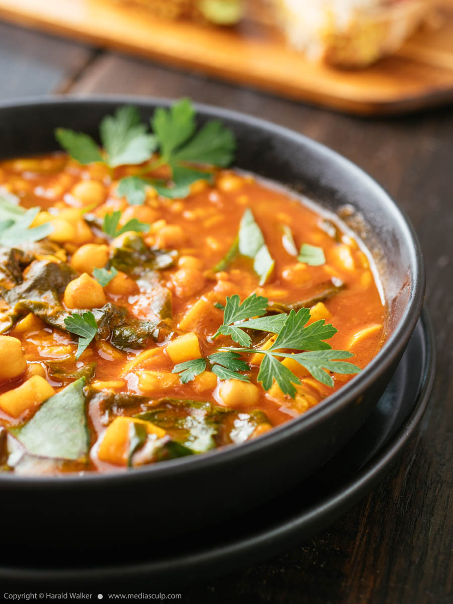 Stock photo of Tomato, Chickpea Soup with Malabar Spinach