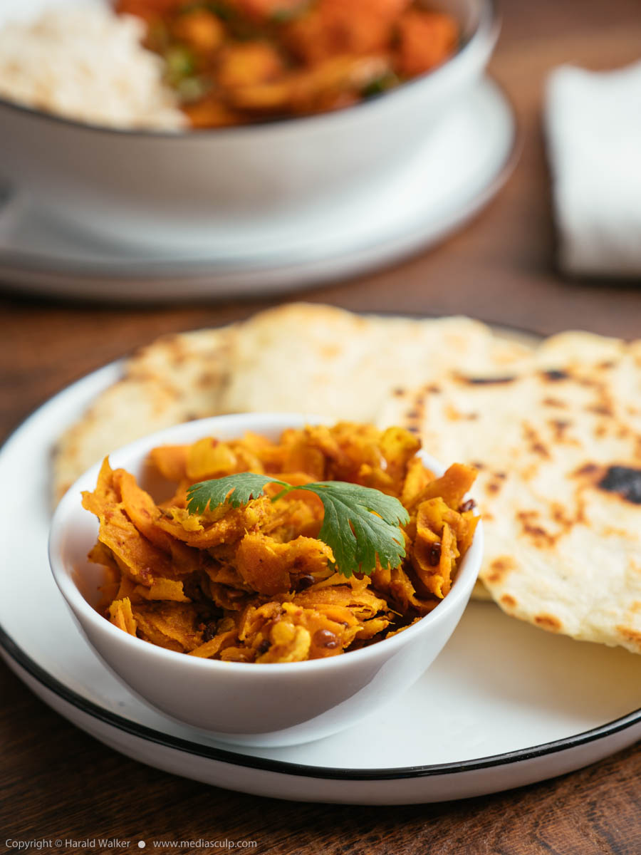 Stock photo of Naan bread and carrot and ginger pickle