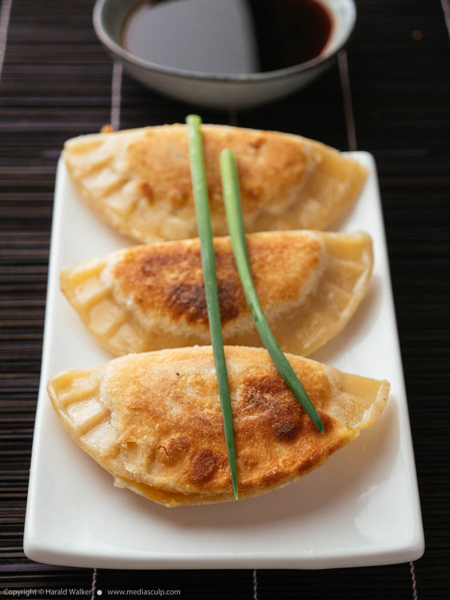 Stock photo of Winter Squash Pot-stickers with Asian Dipping Sauce