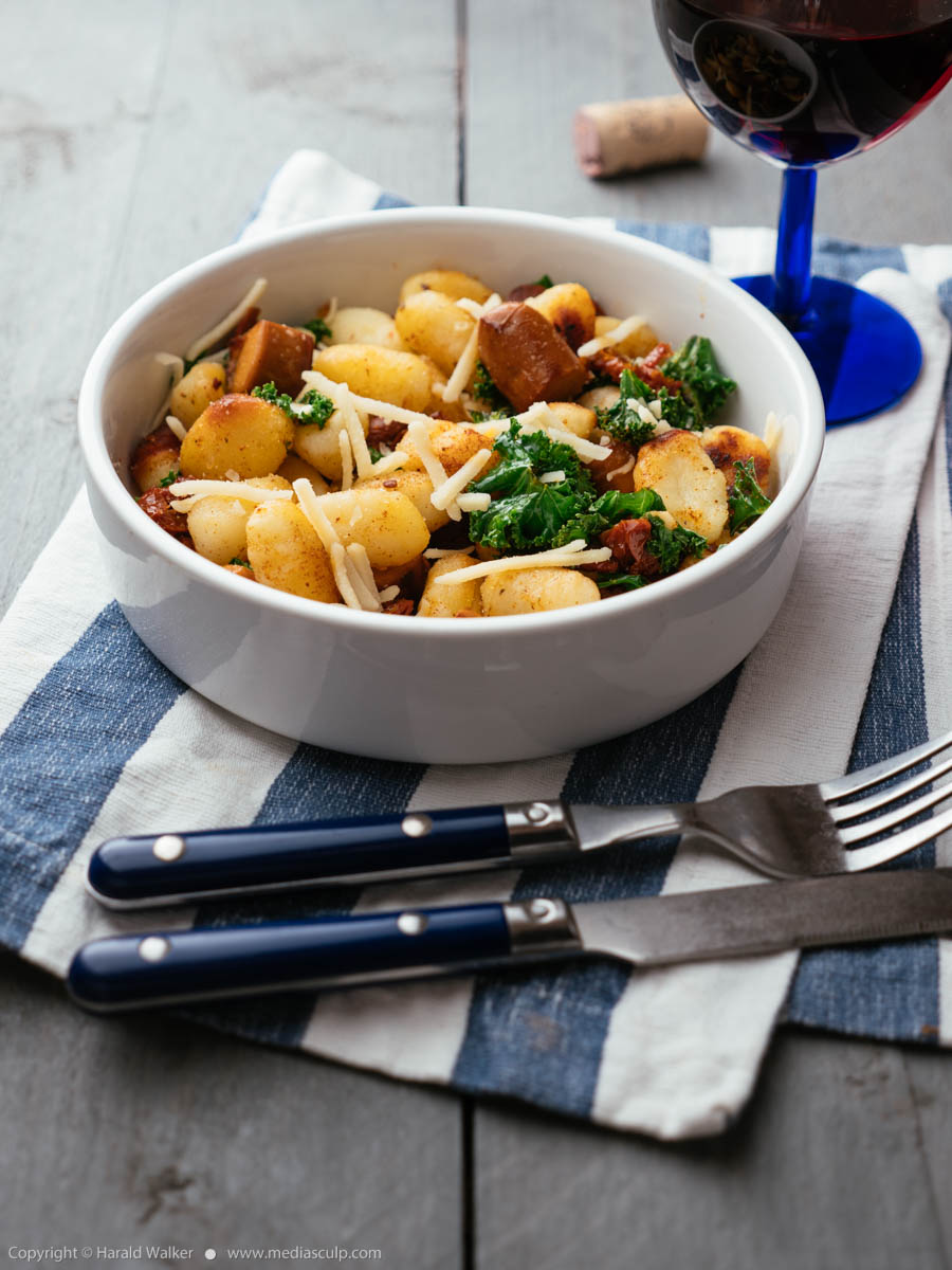 Stock photo of Gnocchi with Vegan Sausage, Kale and Sun-dried Tomatoes
