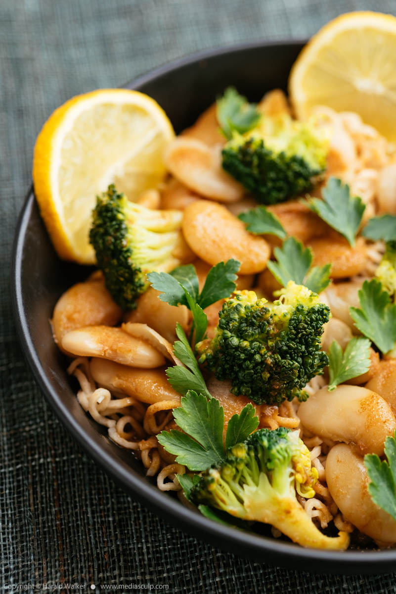 Stock photo of Broccoli and Gigante Beans on Noodles with Lemon Garlic Miso Sauce