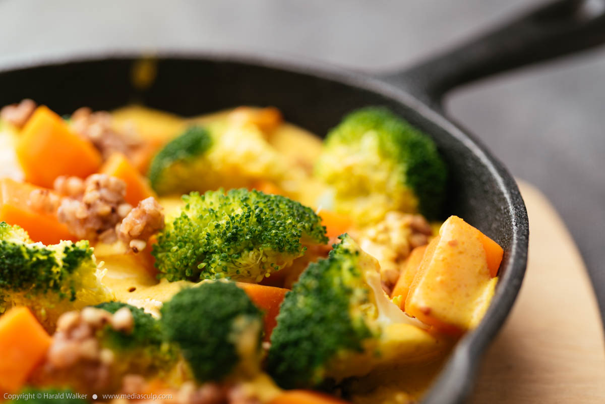 Stock photo of Sweet Potato and Broccoli on Buckwheat with Curry Sauce