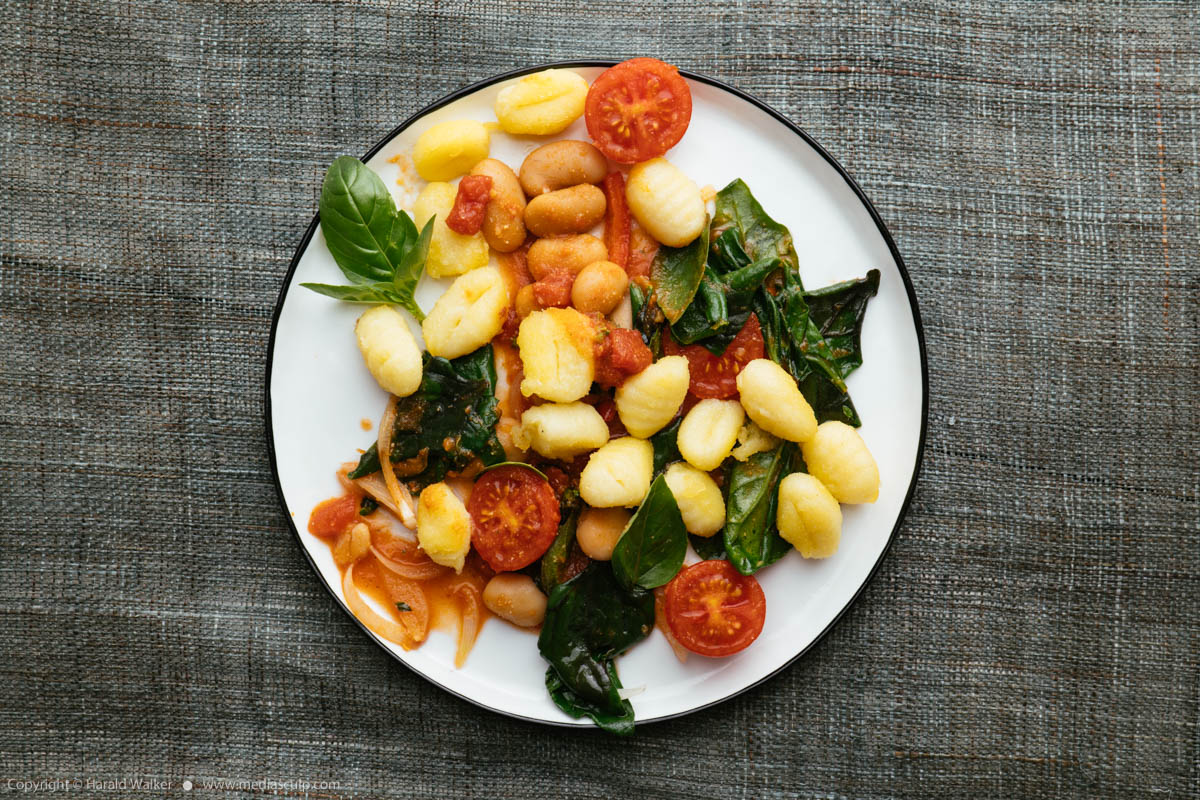 Stock photo of Gnocchi with Tomatoes, Spinach and Giant Beans