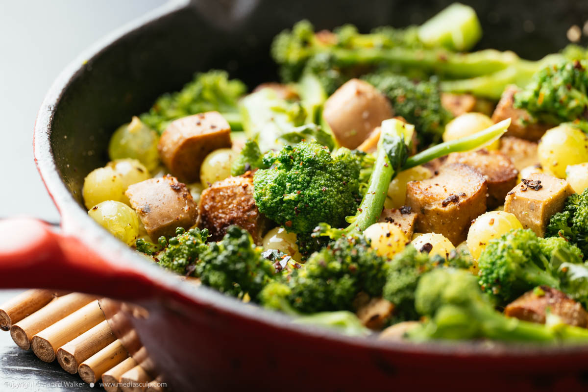 Stock photo of Vegan Sausage with Broccoli and Grapes