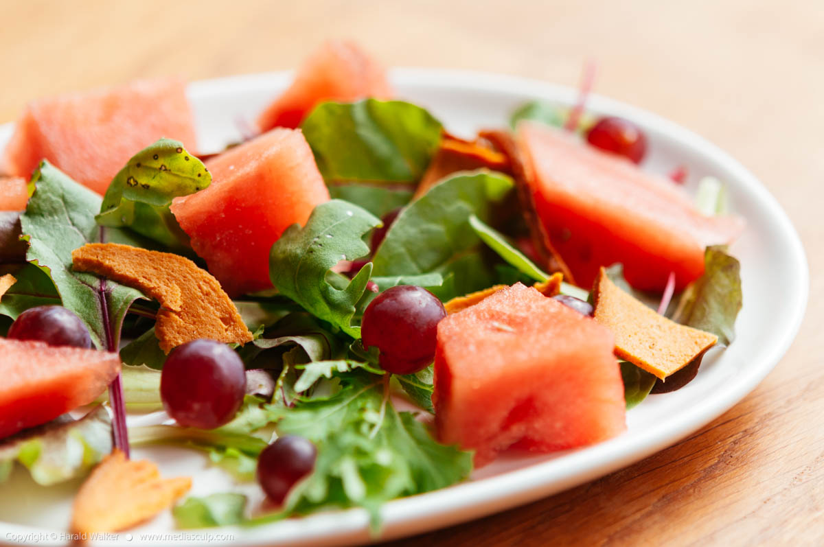 Stock photo of Mixed Salad wih Watermelon, Grapes and Vegan  Bologna