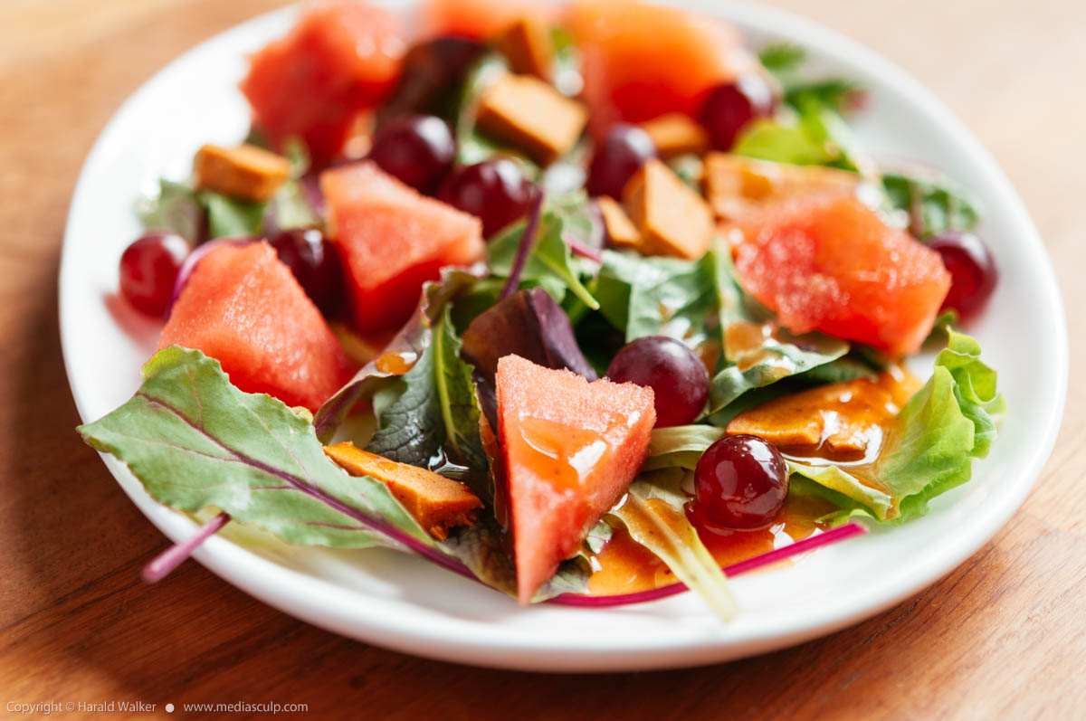 Stock photo of Mixed Salad wih Watermelon, Grapes and Vegan  Bologna