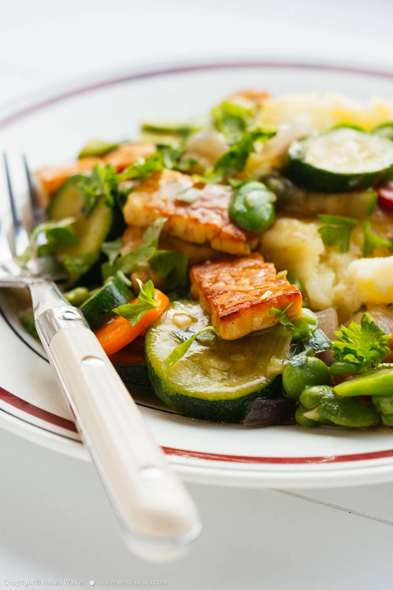 Stock photo of Braised Tempeh with Mixed Vegetables on Mashed Potatoes