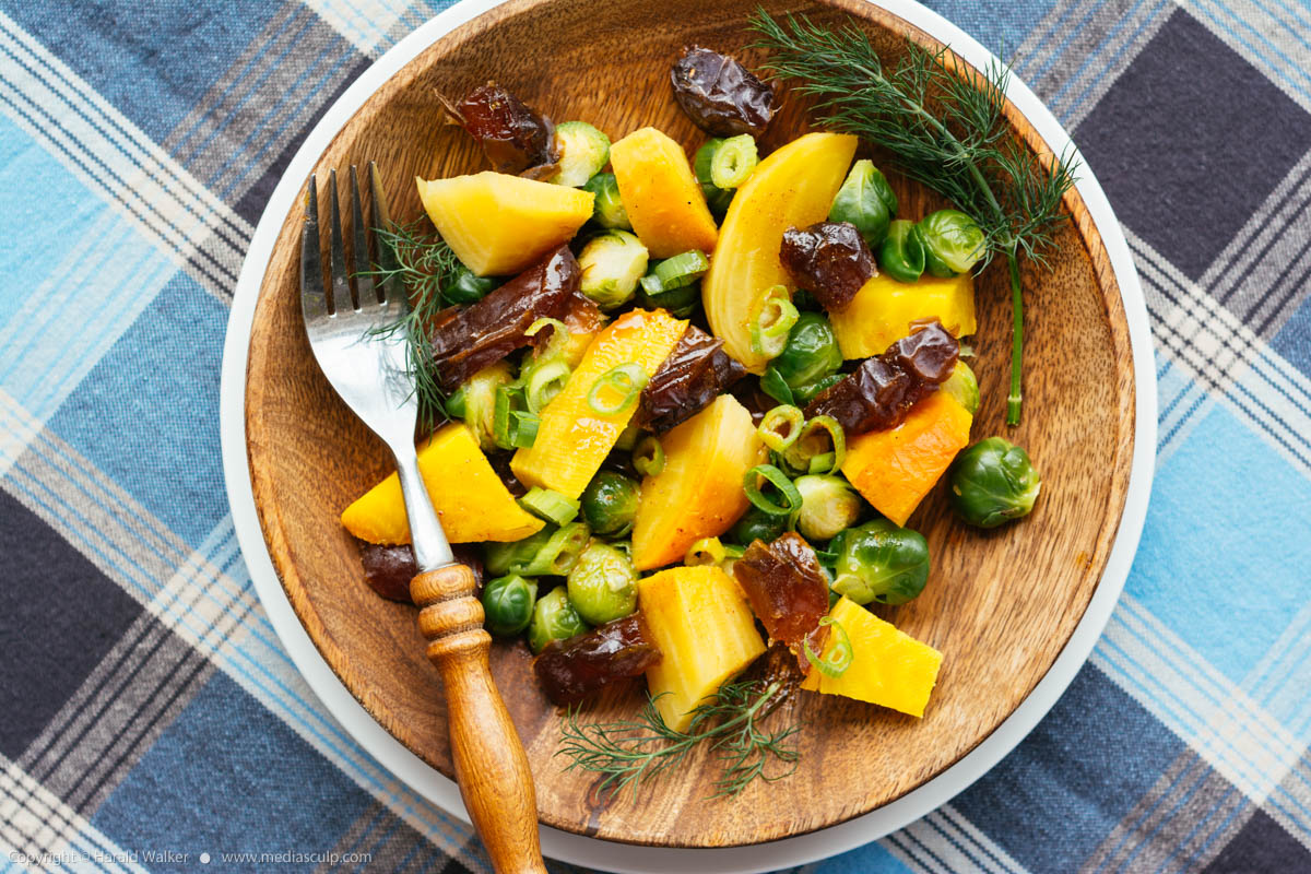 Stock photo of Roasted Yellow Beets with Brussels Sprouts and Dates