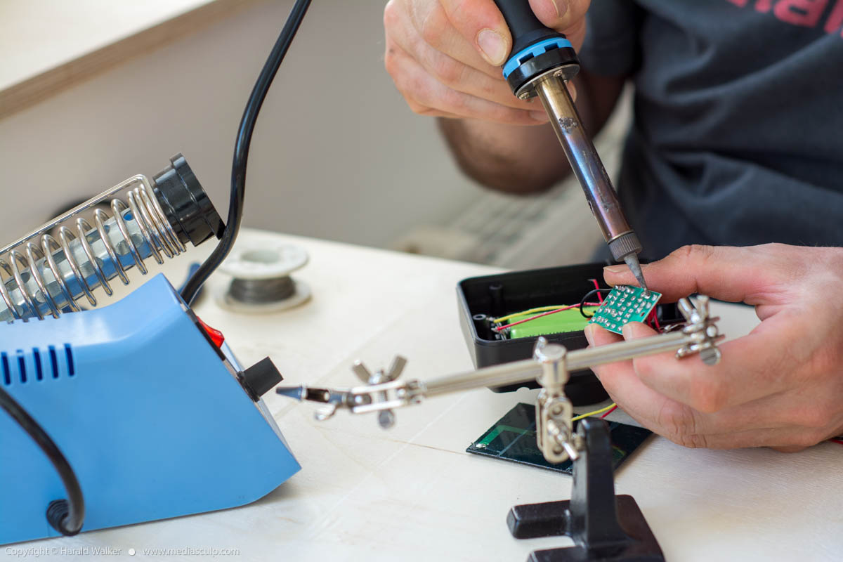 Stock photo of Repairing an eletronic device